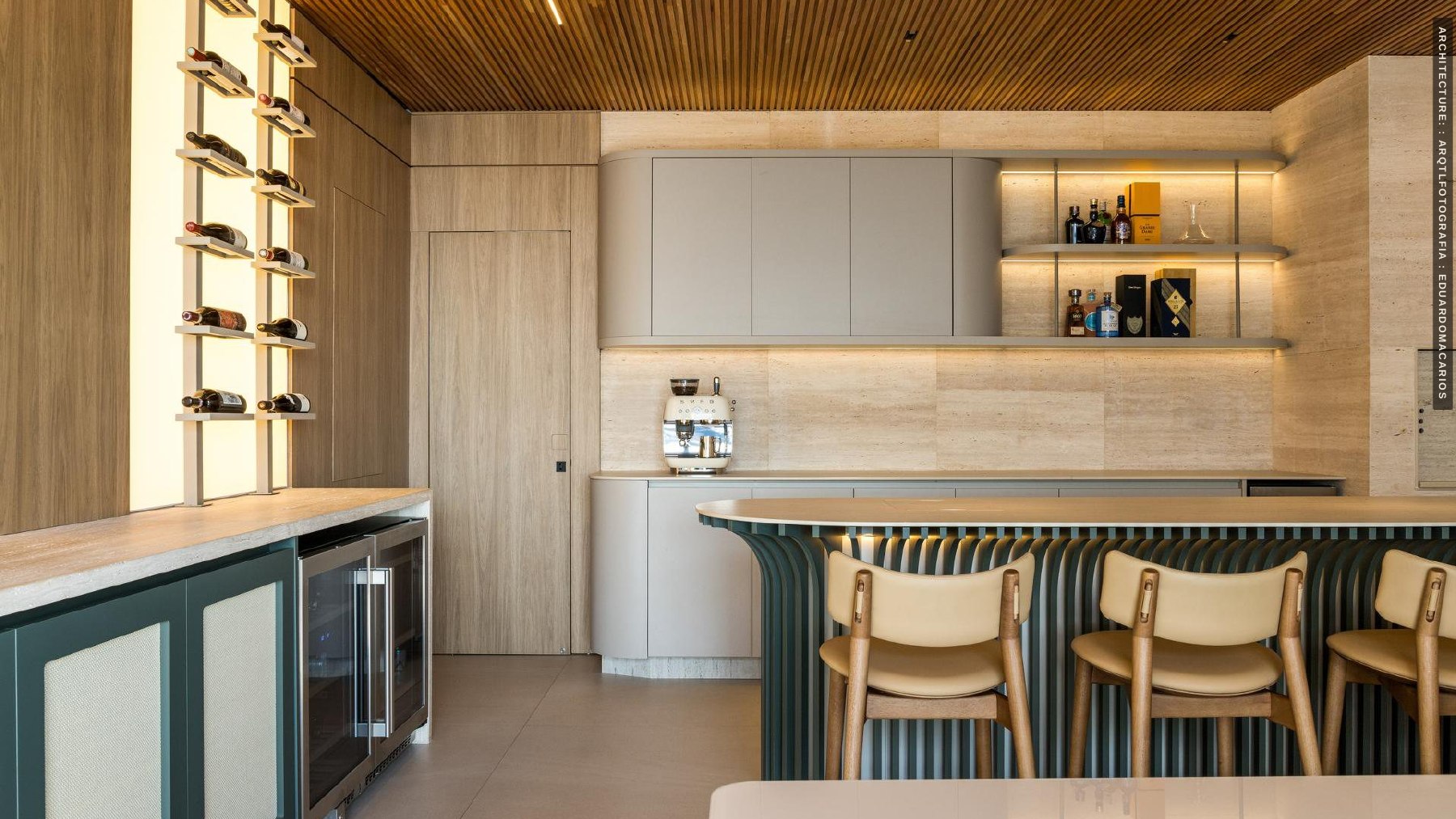 Kitchen with green cabinetry, wood ceiling and a breakfast bar
