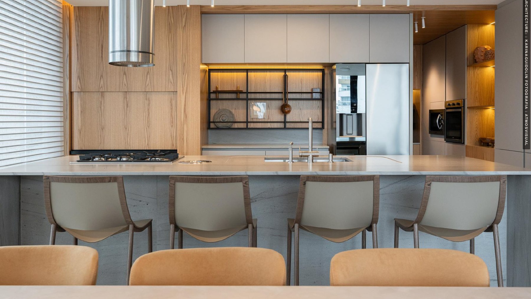 Kitchen with wood cabinetry and an island